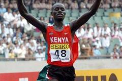 Paul Kirui crosses the finish line (Prakash Singh (AFP) for IAAF)