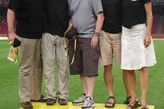 IAAF website editorial and event report team - Turner, Ramsak, Landells (who couldn't find his team shirt!) Morse, and Arcoleo on the Beijing medal podium (Mark Butler)