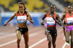 Meseret Defar is successfully defied by Vivian Cheruiyot over 3000m at the 2012 Samsung Diamond League in Doha (Jiro Mochizuki)