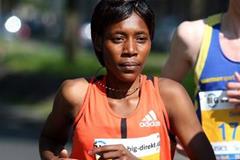 Peninah Arusei en route to her Berlin 25k course record (Victah Sailer)