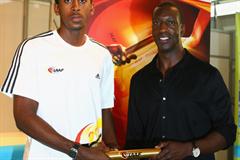 Michael Johnson (R) and Jehue Gordon attend the launch of the IAAF new logo (Getty Images)