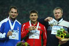 Silver medalist Primoz Kozmus of Slovenia, gold medalist Ivan Tsikhan of Belarus and bronze medalist Libor Charfreitag of Slovakia pose on the podium after receiving their medals in the Men's Hammer Throw Final (Getty Images)
