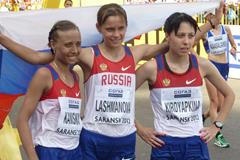 Olga Kaniskina, Elena Lashmanova and Anisya Kirdyapkina celebrate winning team gold in Saransk (IAAF)