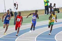 Jamaica's Jahazeel Murphy (154) on his way to completing sprint double with 200m victory - 2009 CARIFTA Games (Jed Charles)