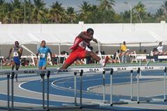 Jehue Gordon (TRI) on his way to setting a CARIFTA 400m Hurdles record (Anthony Debeauville)