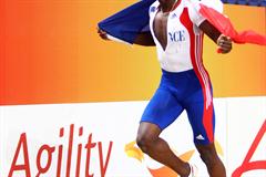 An agile Teddy Tamgho of France celebrates his new World indoor record in the Men's Triple Jump with lap of honour (Getty Images)