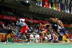 Dayron Robles of Cuba dips to beat Terrence Trammell in the men's 60m Hurdles Final (Getty Images)