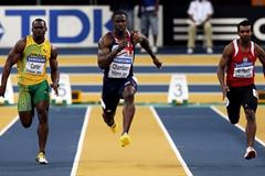 Nesta Carter of Jamaica, Dwain Chambers of GBR and Barakat Mubarak Al-Harthi of Oman in action (Getty Images)