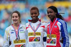 Gold medalist Nnenya HAILEY of USA (c) celebrates with silver medalist Sarah CARLI of Australia (l) and Bronze medalist Zurian HECHAVARRIA of Cuba after the Girls 400 metres Hurdles final - Day Four - WYC Lille 2011 (Getty Images)