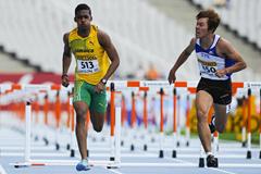 Stefan Fennell of Jamaica wins his Men's 110 metres Hurdles qualification heat on the day one of the 14th IAAF World Junior Championships in Barcelona (Getty Images)