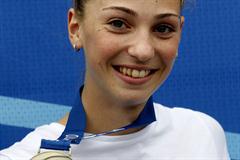 Marija Vukovic of Montenegro wins her country's first major athletics gold medal (Getty Images)