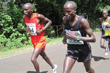 Robert Kipkorir (l) and Augustine Rono battle it out in the final stages of this year's Bringo Half Marathon. Kipkorir won in 1:02:25. (David Macharia)