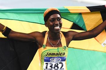 Janieve Russell of Jamaica celebrates after winning the Women's 400 metres Hurdles Final on the day five of the 14th IAAF World Junior Championships in Barcelona on 14 July 2012 (Getty Images)