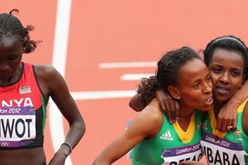 (L-R) Viola Jelagat Kibiwot of Kenya, Meseret Defar and Tirunesh Dibaba of Ethiopia look on after the Women's 5000m round 1 heats on Day 11 of the London 2012 Olympic Games on 7 August 2012 (Getty Images)