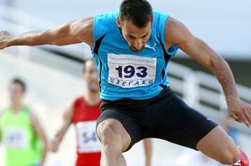 Periklis Iakovakis en route to his 15th straight Greek title in the 400m Hurdles (Kostas Georgopoulos)