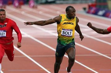 Usain Bolt of Jamaica crosses the finish line ahead of Ryan Bailey of the United States and Justin Gatlin of the United States to win the Men's 100m Semifinal on Day 9 of the London 2012 Olympic Games on 5 August 2012 (Getty Images)