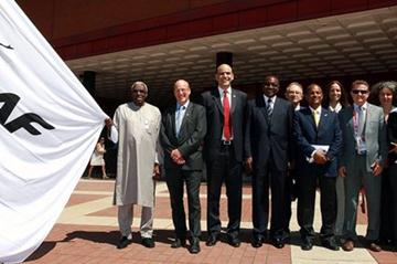 IAAF President Lamine Diack and Steve Morris, the Director of Finance and Corporate Services of the British Library, were joined by IAAF General Secretary Essar Gabriel, the IAAF Director of the President's Office Cheikh Thiare, and other members of the IAAF staff, at a flag raising ceremony today at the British Library Piazza which marked the official inauguration of the IAAF offices at the British Library during the Olympic Games. (Getty Images)