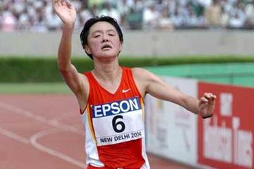 Sun Yingjie triumphant (Prakash Singh (AFP) for the IAAF)