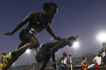 Delano Williams of Turks and Caicos Islands (R) crosses the finish line for winning the Men's 200 metres Final on the day four of the 14th IAAF World Junior Championships in Barcelona on 13 July 2012 (Getty Images)