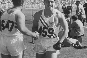 Harold Connolly (facing) is congratulated after his 1956 Olympic Hammer Throw victory in Melbourne, Australia (Time Life Pictures / Getty Images)