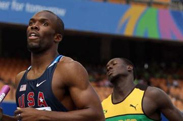 LaShawn Merritt of United States runs the final leg ahead of Leford Green of Jamaica in the men's 4x400 metres relay heats during day six (Getty Images)