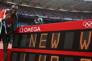 David Lekuta Rudisha of Kenya celebrates next to the clock after winning gold and setting a new world record in the Men's 800m Final on Day 13 of the London 2012 Olympic on 9 August 2012 (Getty Images)