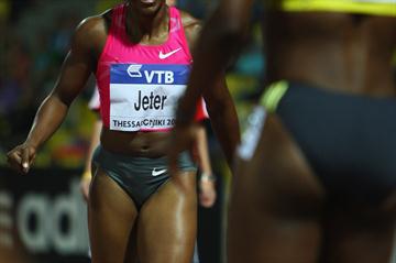 Carmelita Jeter celebrates her 10.64 victory in the women's 100m (Getty Images)