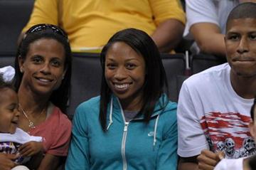 Allyson Felix with Joanna Hayes and Kenneth Ferguson at Los Angeles Sparks WNBA game (Kirby Lee)