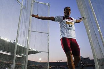 Ashraf Amgad Elseify of Qatar celebrates after setting a new World Junior Record on the Men's Hammer Throw Final on the day five of the 14th IAAF World Junior Championship in Barcelona on 14 July 2012 (Getty Images)