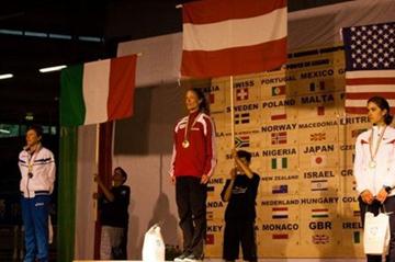 Women's podium at Ponte di Legno, from left: runner-up Valentina Bellotti (ITA), winner Andrea Mayr (AUT), and bronze medallist Morgan Arritola (USA) (WMRA)