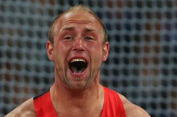 Robert Harting of Germany celebrates winning gold in the Men's Discus Throw Final on Day 11 of the London 2012 Olympic Games at Olympic Stadium on August 7, 2012 (Getty Images)