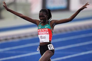 Kenya's Linet Chepkwemoi Masai crosses the line to end the 12 year Ethiopian domiance of the women's 10,000m (Getty Images)