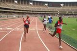 Florence Kiplagat crosses the finish line of the 5000 metres ahead of Mary Wacera and Veronica Wanjiru (Peter Njenga)