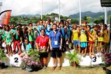 President of French Polynesia Athletics Titaua Maurin-Juventin and IAAF Vice President Sebastian Coe assist the IAAF Kids' Athletics programme in Papeete (OAA)