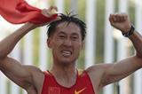 Zhen Wang of China celebrates winning the 20km at the IAAF World Race Walking Cup in Saransk (Getty Images)