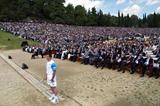 Kostas Gatsioudis, the three time World Javelin medallist, prepares to start the 2004 Torch Relay at the stadium in Olympia (Getty Images)