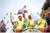 Ethiopian team are welcomed home on top of a bus in Addis Ababa (Abel Tadege)