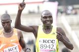 Vincent Chepkok (right) celebrates winning the 5,000m as Joseph Ebuya (left) trails him in the New KCC National Trials for the 2009 World Championships in Athletics at the Nyayo National Stadium in Nairobi (Elias Makori)