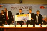 IAAF Vice President Sergey Bubka and Russian Deputy Minister of Sport Pavel Kolobkov hold a large Moscow 2013 ticket (Moscow 2013 LOC)