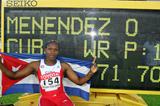 Osleidys Menendez poses in front of the World record board (Getty Images)