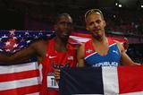 (R-L) Gold medalist Felix Sanchez of Dominican Republic and silver medalist Michael Tinsley of the United States pose after the Men's 400m Hurdles final on Day 10 of the 2012 Olympic Games in London on 6 August 2012 (Getty Images)