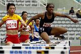 Syria's Ghofrar Al Mouhmad on the way to winning the women's 400m Hurdles in Macau (Charlie Lee)