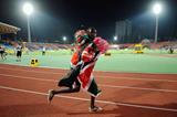Lilian Rengeruk on her victory lap after winning the girls' 3000m at the World Youth Championships in Donetsk (Getty Images)