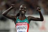 Vivian Jepkemoi Cheruiyot of Kenya celebrates as she crosses the finish line to win the women's 10,000 metres final during day one  (Getty Images)
