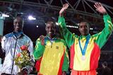 Eric Wainaina of Kenya (left) with his Sydney Olympic silver (Getty Images)