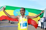 Dereje Debele celebrates his victory and course record at the Dusseldorf Marathon (Victah Sailer)