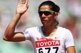 Ana Guevara of Mexico salutes the crowd after advancing to the 400m semi-finals (Getty Images)