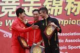 2010 Race Walking Challenge Final men's podium (l to r) -  runner-up Chu Yafei (CHN), race winner Zhen Wang (CHN), and Giorgio Rubino (ITA) (organisers)