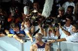 Journalists interview athletes in the Mixed zone at the IAAF World Championships (Getty Images)