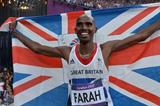 Mo Farah of Great Britain holds a Union flag as he celebrates winning gold in the Men's 5000m Final of the London 2012 Olympic Games (Getty Images)